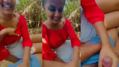 Sexy GF gives an outdoor handjob to her lover